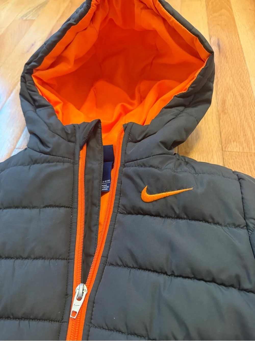 Nike Kids Gray Puffer Jacket with Orange Accents